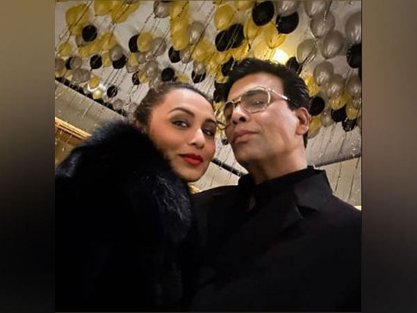 Karan Johar Rani Mukerji Twin In Black At New Year Bash Pose For