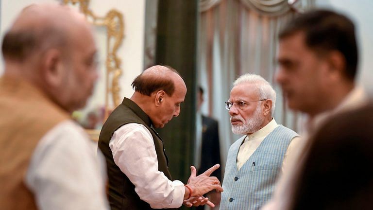 File image of Prime Minister Narendra Modi with Defence Minister Rajnath Singh, with Home Minister Amit Shah (in the background) | Atul Yadav | PTI