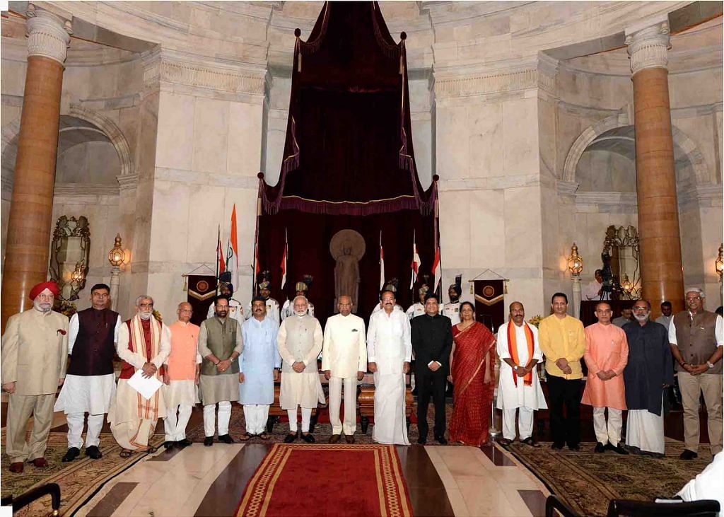 Prime Minister Narendra Modi stands with the President, Vice President and his council of ministers in Rashtrapati Bhavan on 3 September, 2017.