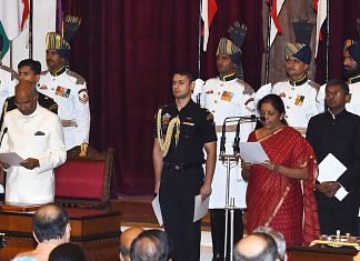 Nirmala Sitharaman being sworn in as defence minister by President Ram Nath Kovind
