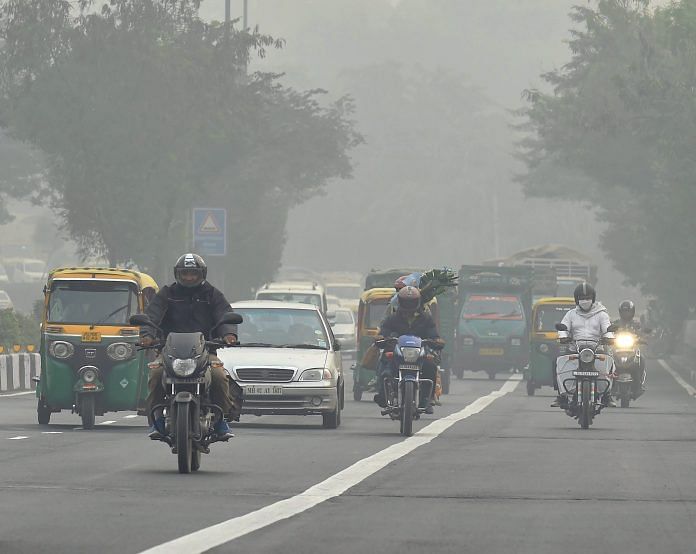 People driving through smog
