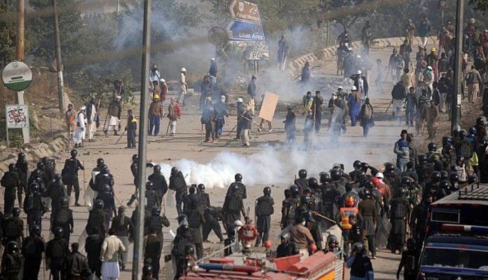 Pakistani security forces clash with protesters.
