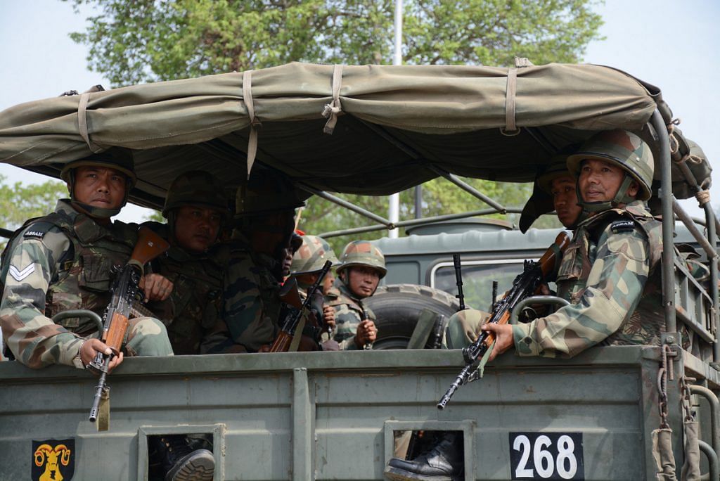 Indian Army soldiers in a truck.