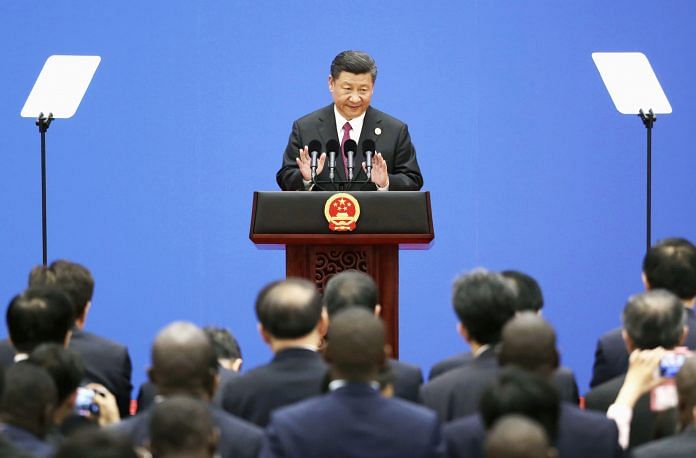 Xi Jinping addressing the conference in Beijing