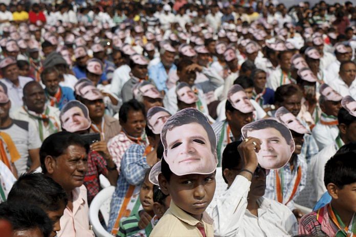 People seen wearing masks of Congress vice-president Rahul Gandhi while attending a public rally in Gandhinagar.