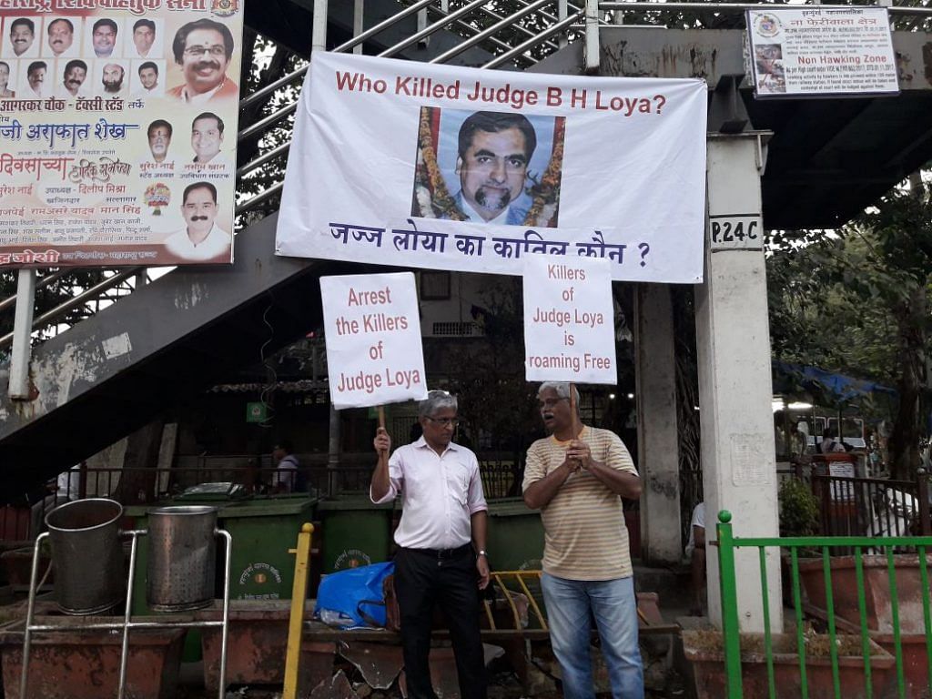 Two persons demanding a probe into judge B.H. Loya's demise 