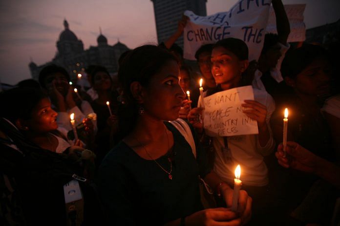 A candle light rally to protest against terror attacks in Mumbai at Gateway of India in 2008