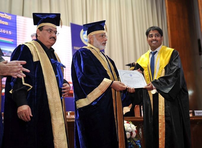 PM Narendra Modi handing out degrees at a graduation ceremony