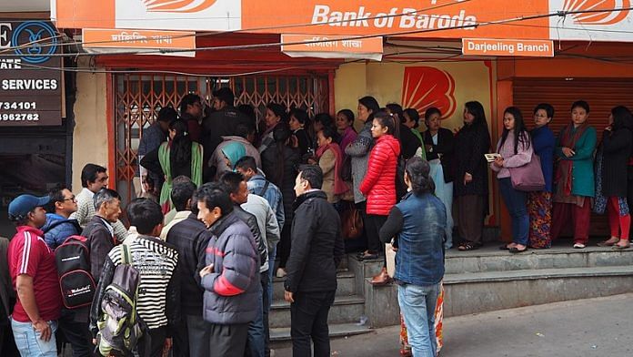 Queues outside an ATM after demonetisation was announced