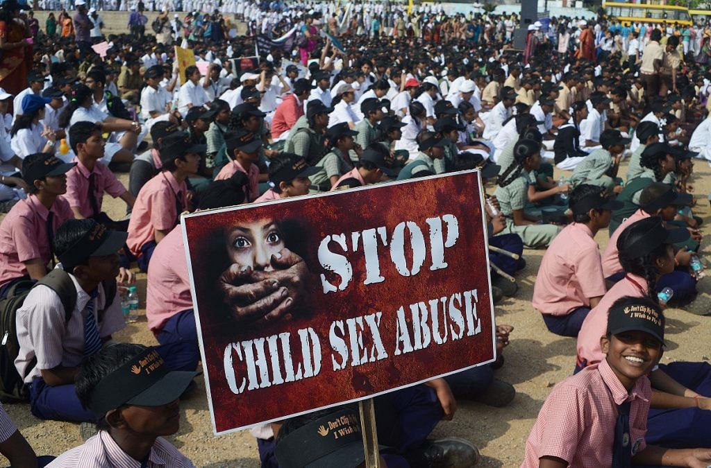 Schoolchildren participating in an awareness campaign against child sex abuse