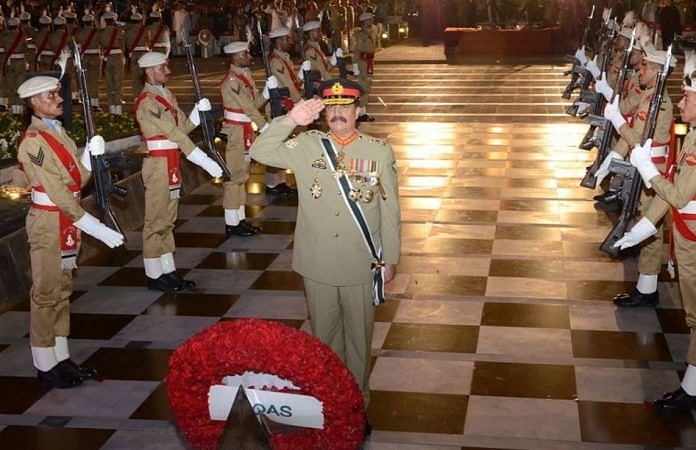 Retired Pakistan Army Chief General Raheel Sharif salutes at a ceremony