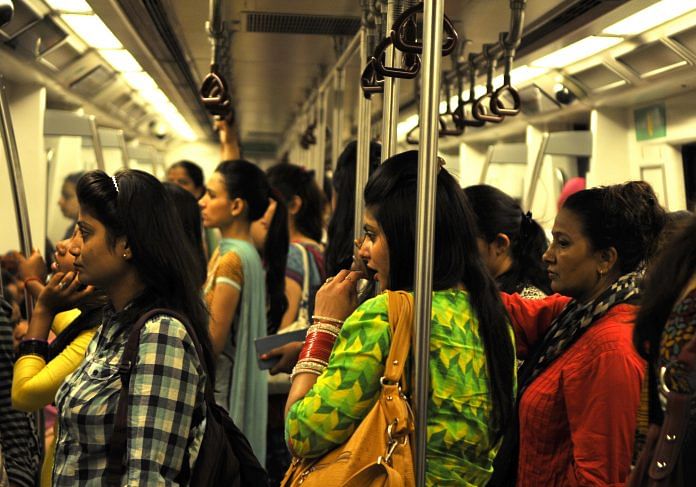 Women travel inside a metro