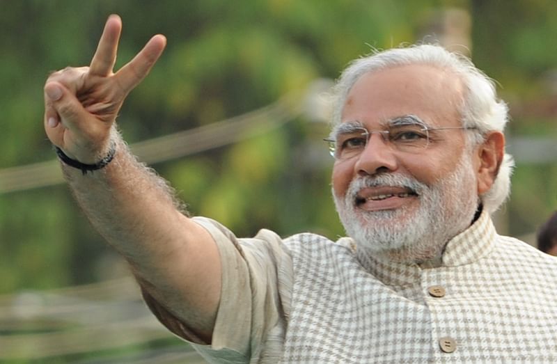 Narendra Modi holding up the peace sign