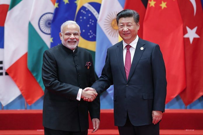 File photo of Xi Jinping and Narendra Modi.