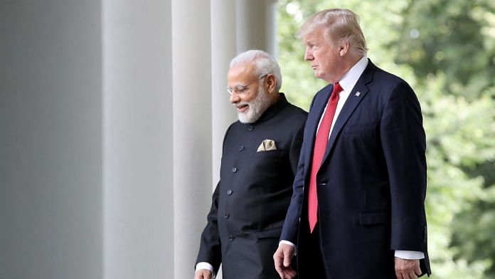 Modi and Trump walking