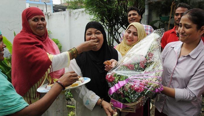 women celebrating and eating sweets