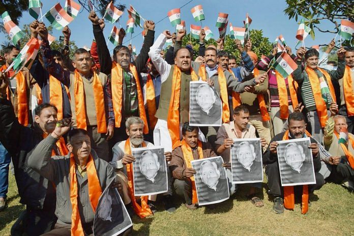 Activists of Shiv Sena and Dogra Front shout slogans during a protest against suspended Congress leader Mani Shankar Aiyar