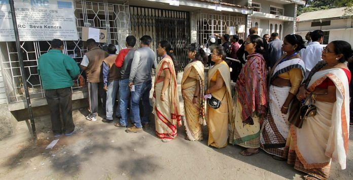File photo of people outside a NRC Seva Kendra in Guwahati | PTI