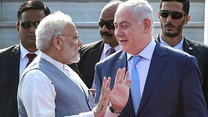 Prime Minister Narendra Modi talks his Israeli counterpart Benjamin Netanyahu