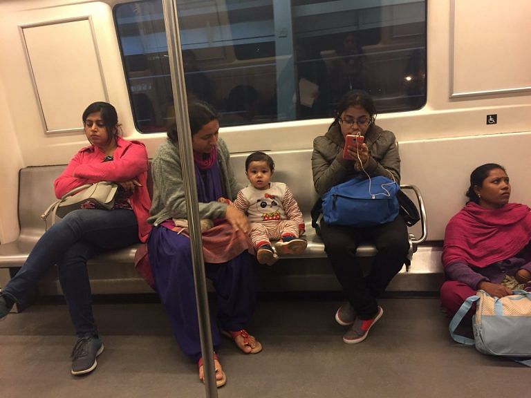 Even in an empty Delhi metro coach, middle-class Indians make their maids sit on the floor