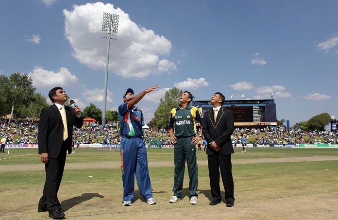 Sanjay Manjrekar (L) Mahendra Singh Dhoni of India, Younis Khan of Pakistan and match referee Roshan Mahanama at the coin toss beforeThe ICC Champions Trophy Group A Match between India and Pakistan on September 26, 2009 at The Supersport Stadium in Centurion, South Africa.