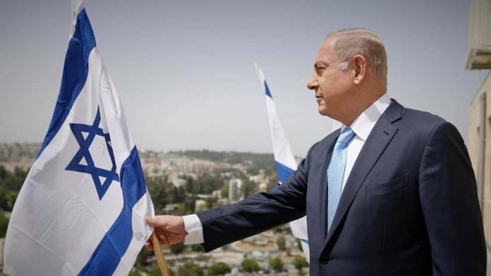 Israel prime minister with Israel flag