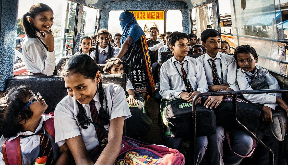 School children from an Indian school in a bus.