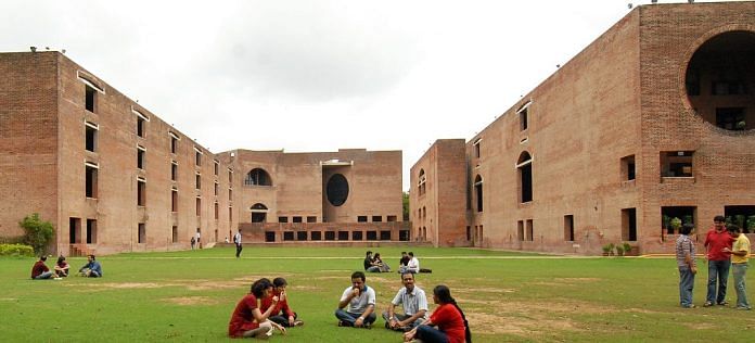 Students sitting in the campus lawns | Facebook