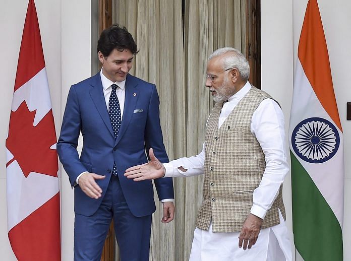 Prime Minister Narendra Modi greets his Canadian counterpart Justin Trudeau