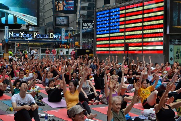 Americans celebrating International Yoga Day at Times Square