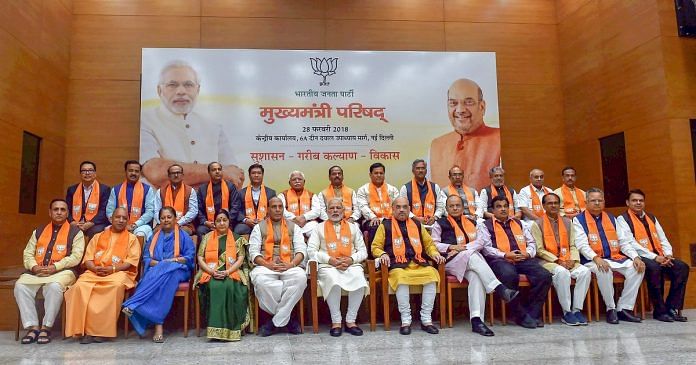 Prime Minister Narendra Modi, BJP President Amit Shah and other parliamentary board members with the party chief ministers, in a meeting at party headquarters in New Delhii