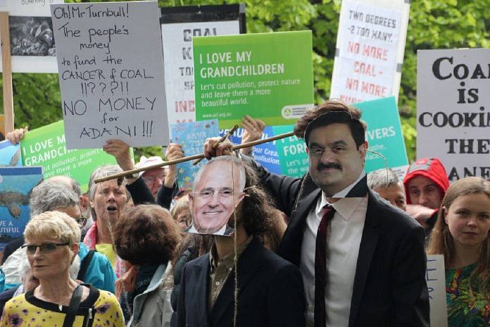 Environmentalists protesting the endangerment of the Great Barrier Reef