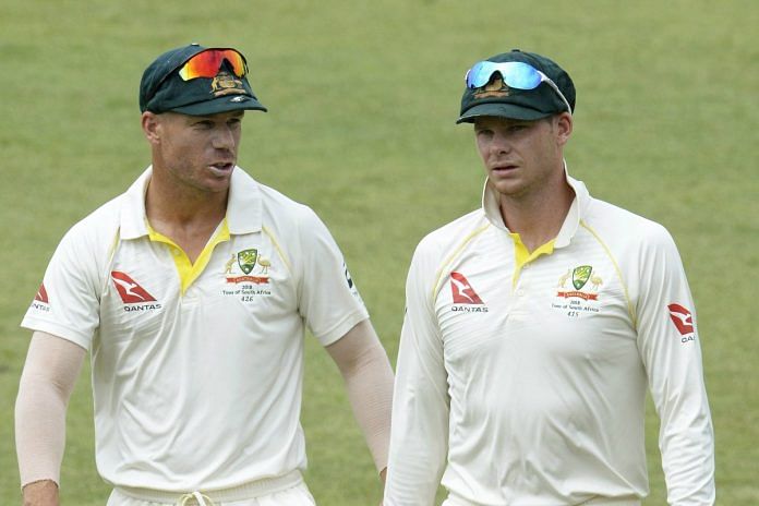 Australian cricketers Steve Smith (R) and David Warner (L)