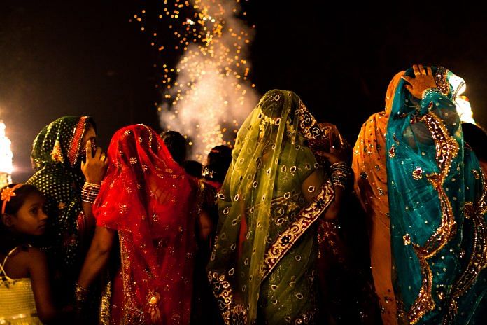 A wedding procession in India. Daniel Berehulak/Getty Images