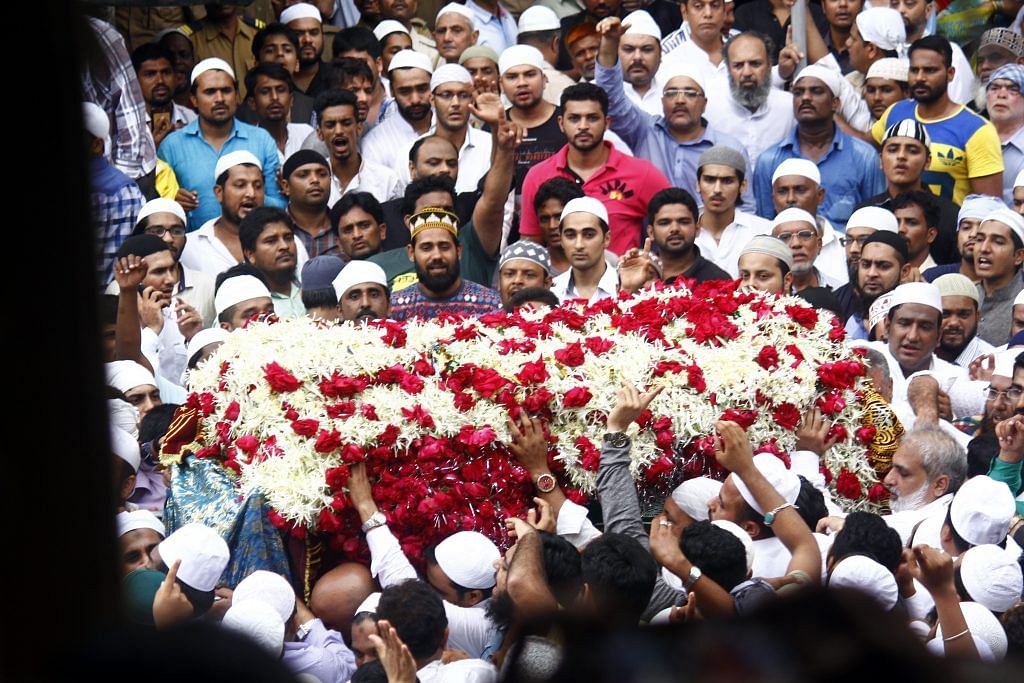 People carry the body of Yakub Abdul Razak Memon outside his family residence during his funeral in Mumbai, 2015. Anadolu Agency/Getty Images