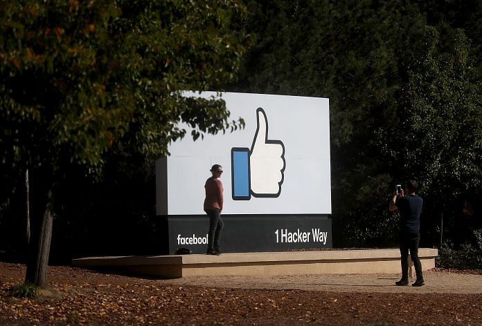 A sign is posted in front of Facebook headquarters in Menlo Park, California. | Justin Sullivan/Getty Images