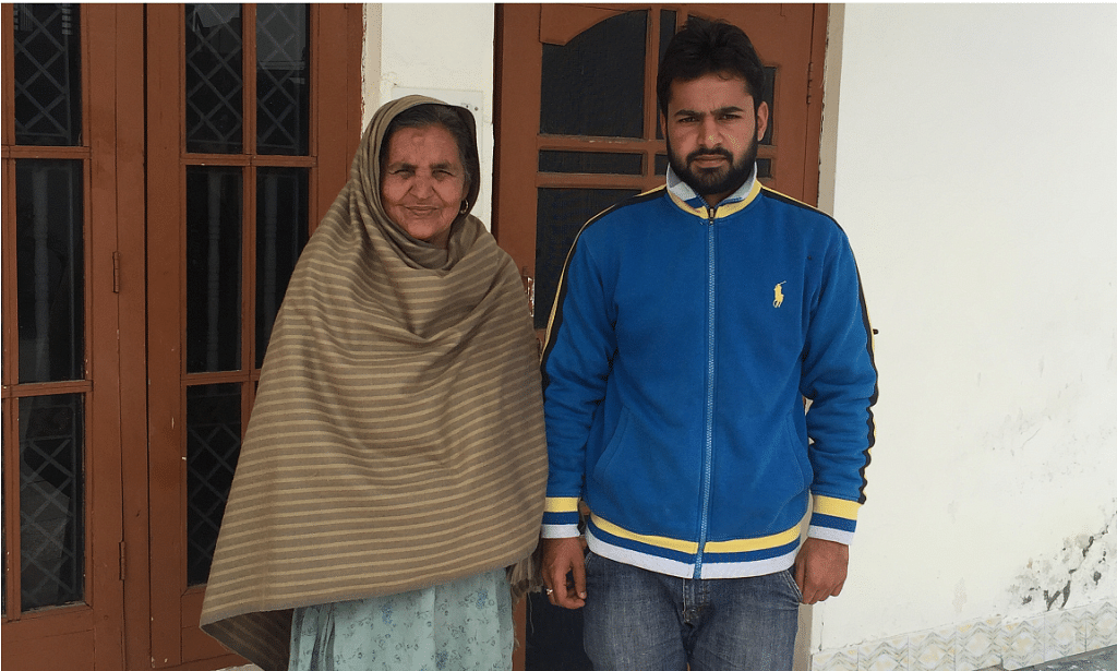 Shelling victim's son Puneet Choudhary with his mother