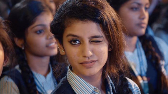 A still from the official trailer of the movie Oru Adaar Love where Priya winks