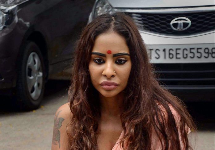 Telugu actor Sri Reddy sits during a 'strip protest' outside the Telugu Film Chamber of Commerce | PTI