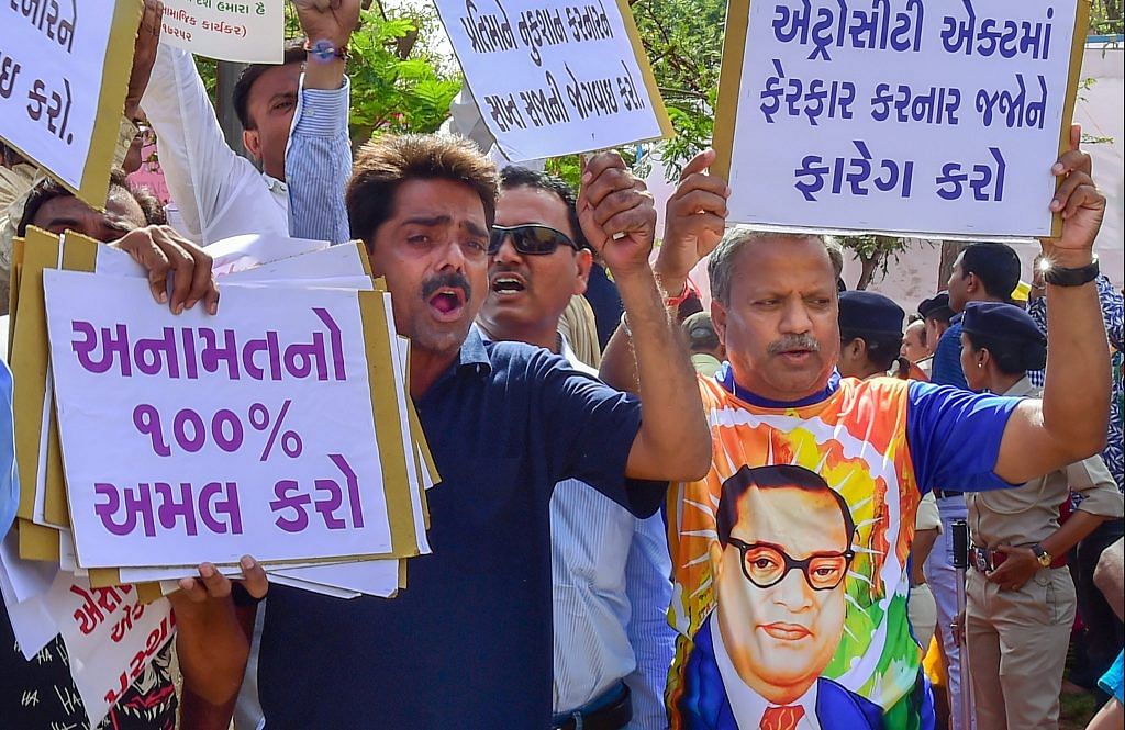 Dalit activists protest against the alleged 'dilution' of Scheduled Castes/Scheduled Tribes act | PTI