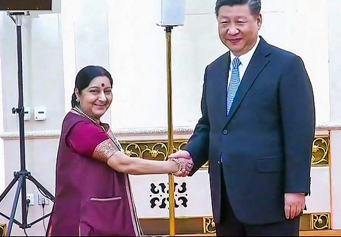 File photo of Sushma Swaraj with Chinese President Xi Jinping in Beijing | PTI