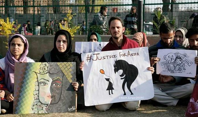 Protesters demanding justice for the 8-year-old girl who was raped and murdered | Twitter @Saif_Says