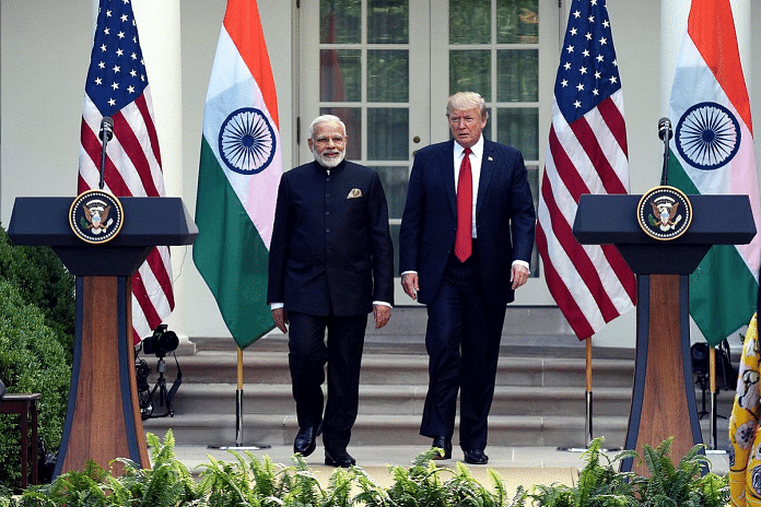 Narendra Modi (L) and Donald Trump (R)