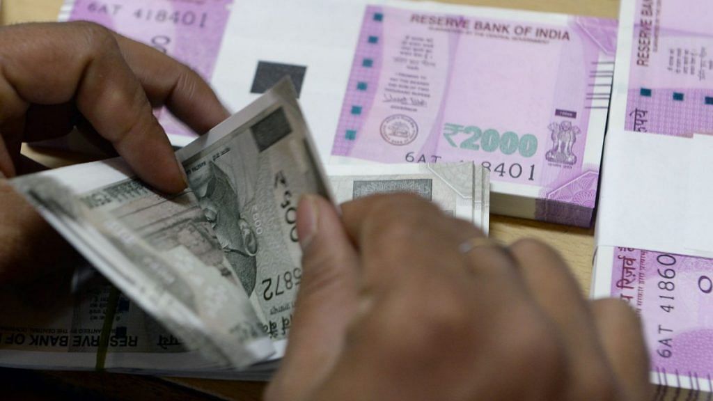 Indian currency | Indranil Mukherjee/AFP/Getty Images