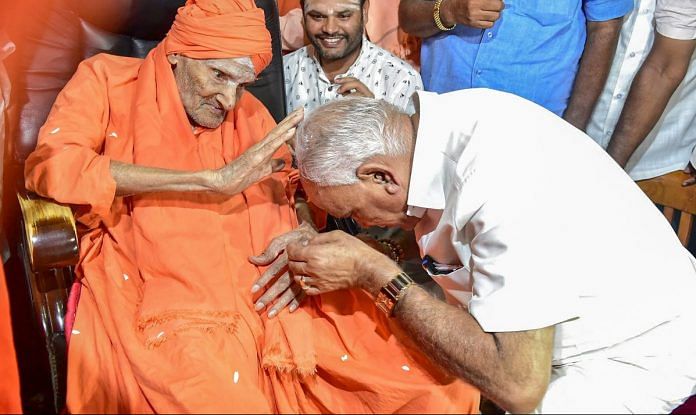 Newly-elected Karnataka chief minister BS Yeddyurappa seeks the blessings of Shivakumara Swami
