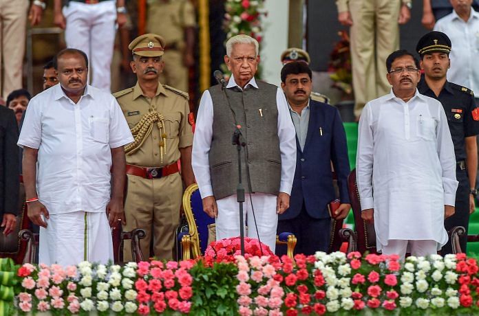 Karnataka governor Vajubhai Vala at Karnataka chief minister H. D. Kumaraswamy swearing-in with deputy chief minister G. Parameshwara | PTI