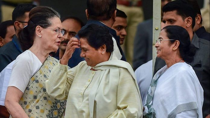 File photo of Sonia Gandhi with BSP's Mayawati and Mamata Banerjee in Bengaluru | PTI