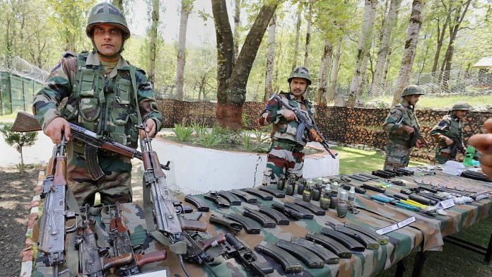 Army personnel display a huge cache of arms and ammunition (representational image) | PTI