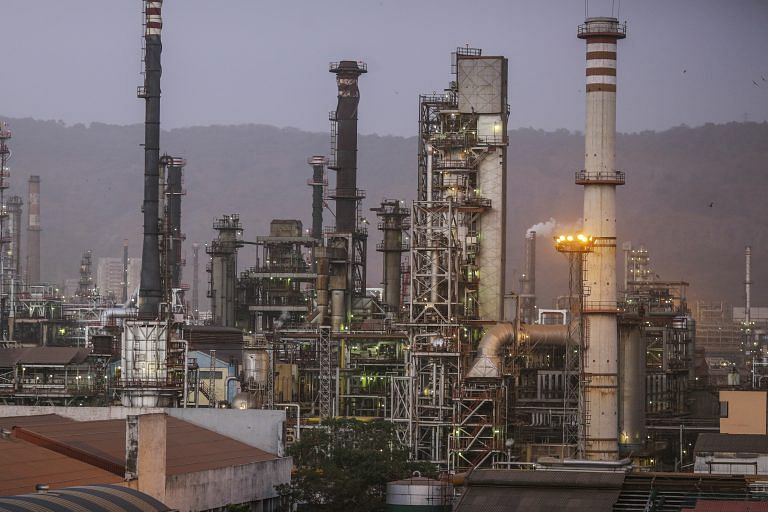 Oil prices plummet to 17-year low as demand sinks and crude surplus balloons