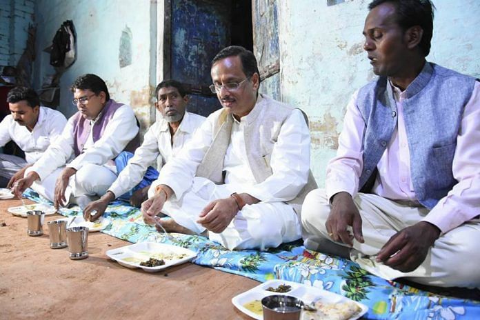 UP Deputy CM Dinesh Singh at a dalit home